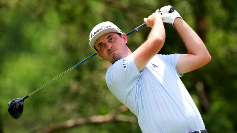 J.T. Poston of the United States plays his shot from the second tee during the final round of the the Memorial Tournament presented by Workday 2026 at Muirfield Village Golf Club